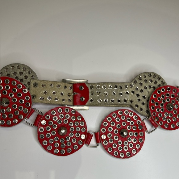 Designer unknown 1960s vintage disco style red leather and grommet belt. - Picture 1 of 5